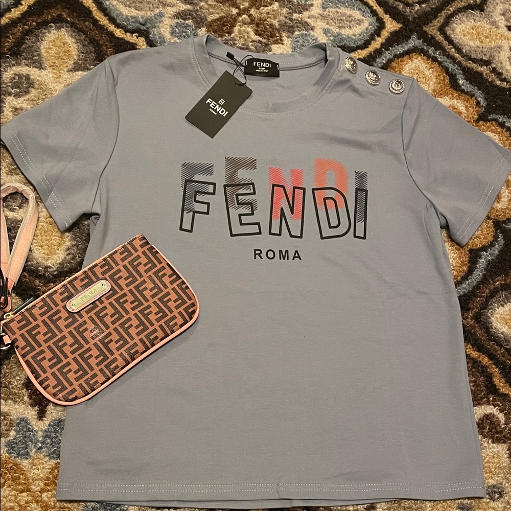 Fashion  Light Gray/Blue  T-Shirt with Bold Logo. Wristlet sold separately.***